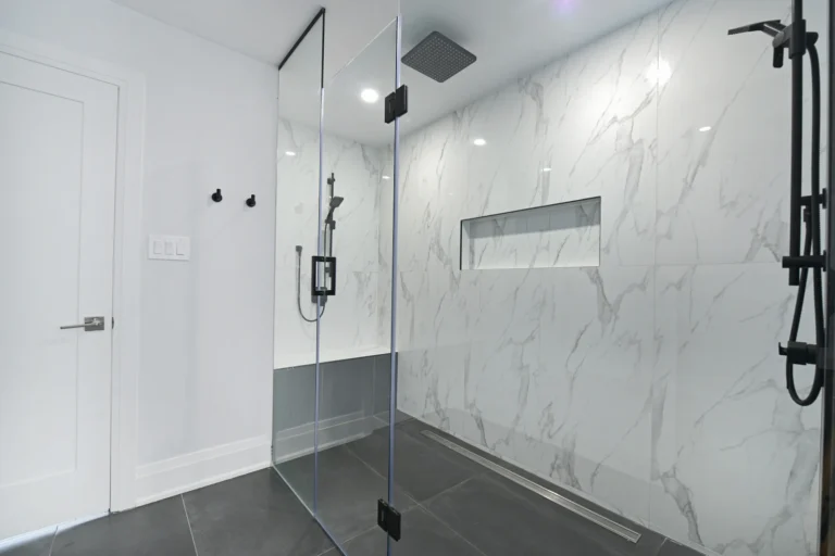 Inspiration: bathroom with glass shower and marble walls