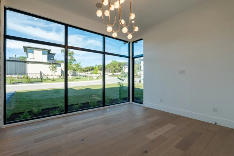 Bright empty room with large windows